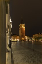 Bell tower on the market square at night, Krakow, Poland