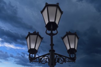 Lantern against thunderstorm sky, Kraklau, Poland