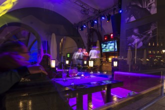 View of a karaoke bar at night, Krakow, Poland