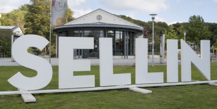 Large letters stand in a meadow and form the word SELLIN, Tourist-Information, Sellin, Baltic