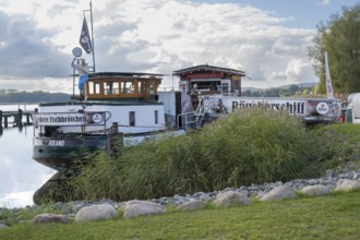 Smoking ship, restaurant ship on Lake Selliner, grass in front of the ship, Sellin, Baltic resort,