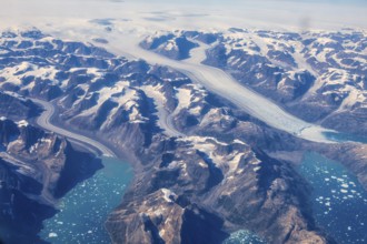 Aerial view of Greenland ice sheet, Arctic landscape, frozen wilderness, glaciers and snow-covered