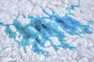 Aerial view of meltwater on the Greenland ice sheet, Arctic landscape, frozen wilderness, glaciers