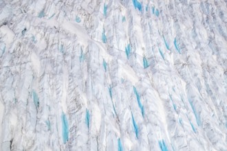 Aerial view of meltwater on the Greenland ice sheet, Arctic landscape, frozen wilderness, glaciers