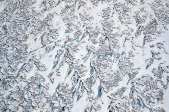 Aerial view of meltwater on the Greenland ice sheet, Arctic landscape, frozen wilderness, glaciers
