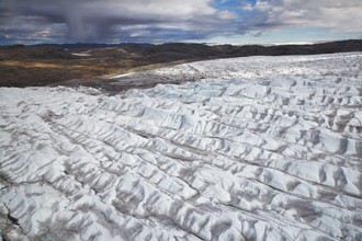 Aerial view and coast and Greenland ice sheet, Arctic landscape, frozen wilderness, glaciers and
