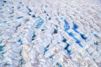 Aerial view of meltwater on the Greenland ice sheet, Arctic landscape, frozen wilderness, glaciers