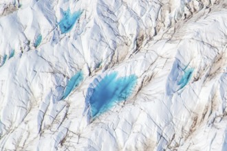 Aerial view of meltwater on the Greenland ice sheet, Arctic landscape, frozen wilderness, glaciers