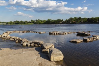 Enclosure built with rocks and stones in Des Mill-Iles RIver to contain fish when the water level
