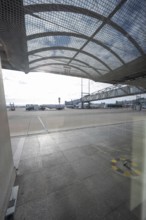 Apron covered by a grid construction with far-reaching views and sunlight, Stuttgart Airport,