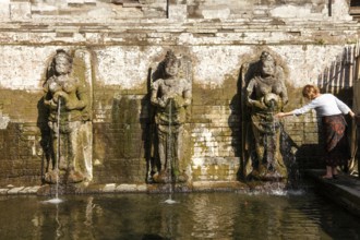 Ritual swimming pool at Goa Gajah elephant cave, Bali, Indonesia