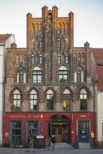 Historic brick Gothic buildings on the market square of the Hanseatic City of Greifswald,
