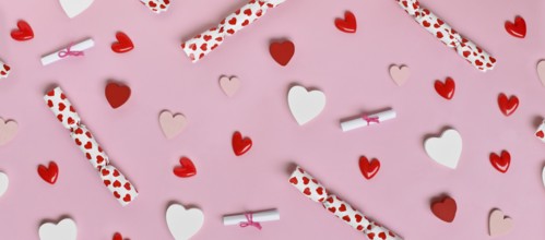 Cute Valentine's Day banner with pink, white and red hearts and small gift bags on a pastel pink
