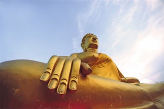 The huge, seated golden Buddha in Pattaya. Wat Phra Yai temple, Chonburi province. Buddha,