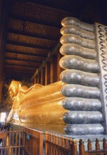 Reclining Buddha, Wat Pho The reclining Buddha symbolizes the last earthly hours in front of