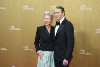 Mads Mikkelsen with woman Hanne Jacobsen, EUROPEAN FILM AWARDS Berlin 2026, photo call at the House