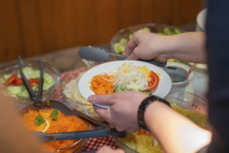 A plate of freshly made salads is served