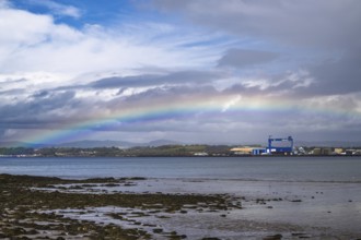 Rainbow over Forth Estuary, Forth Bridge, Queensferry Crossing, Scotland, UK