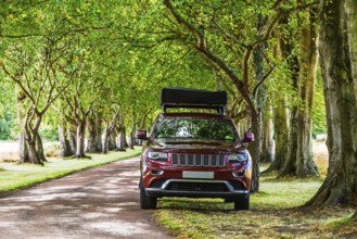 4x4 car trip with roof tent on the Scottish wilderness, Scotland, United Kingdom