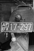 Old tractor license plate from the 1950s, on a former Franconian farm, black and white, Bavaria,