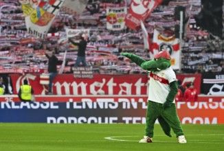 Mascot Fritzle VfB Stuttgart in front of fan block, fans, fan curve, flags, atmosphere, atmospheric