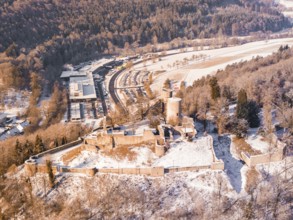 Snowy castle on a hill surrounded by thick forests and snowy surroundings, Nagold, Calw district,