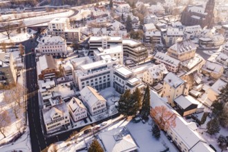 Snowy town with many houses and roads in the winter sun, Nagold, Calw district, Black Forest,