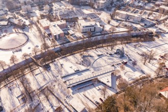 Aerial view of a snowy park with buildings and trees, Nagold, Calw district, Black Forest, Germany