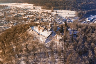 Snowy castle surrounded by winter forests near a town, Nagold, Calw district, Black Forest, Germany