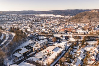 Extensive snow-covered town in winter with numerous houses, Nagold, Calw district, Black Forest,
