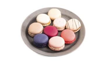 Macarons colourful cookies dessert isolated on white background, close up, side view
