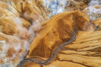 Aerial view of the misty geothermal landscapes of Hveradalir, located in the active Kerlingarfjöll