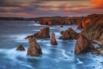 Sunset over the towering Stacks of Mangersta, with dramatic cliffs and rugged coastline, Atlantic