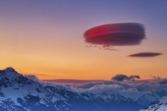 Lenticular clouds over Zermatt at sunset in winter, Valais, Switzerland