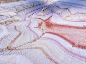 Sunset at Kyzylkup Hills (Tiramisu), colorful layered rock formations with red and white bands,
