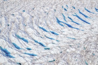Surface meltwater on the Greenland Ice Sheet, visible impact of climate change, Aerial view,