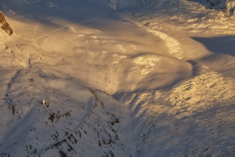 Sunset at Monte Rosa Hut (2, 883?m), alpine refuge in the Pennine Alps on the Italy–Switzerland