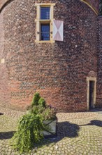 Thief tower, registry office, historic city prison, prison, brick building, façade with windows and