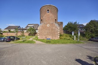 Holkensturm, historic city fortification, tower, parking lot with cars, residential building,