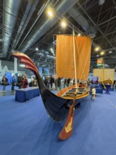 Press photo of replica Viking ship Viking boat sailing ship, large rudder blade in the middle of