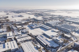 Extensive industrial area under a blanket of snow and clear skies, Wolfsberg industrial area,