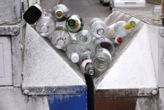 Empty bottles on a dumpster, Germany