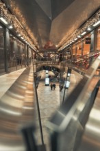 Modern architecture of a shopping mall, rich in reflections and lighting, London, England, Great