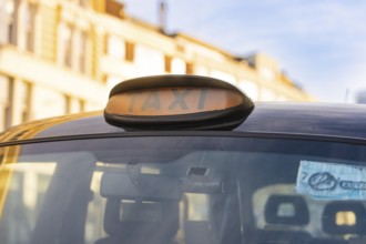 Close-up of a taxi roof sign on a London taxi, London, England, Great Britain