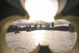 View of a river at sunset through an architectural opening, London, England, Great Britain