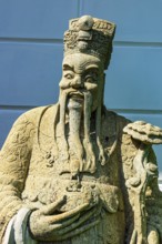 The Grand Royal Palace, mystical stone figure in front of the white pagoda, Phra Nakhon, Bangkok,