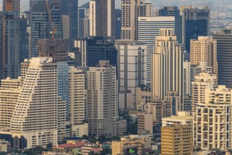 Over the rooftops of Bangkok, view from the Moon Bar on the roof terrace of the Banyan Tree Hotel,