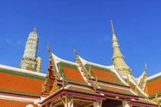 The Grand Royal Palace, Wat Phra Kaeo Buddhist Temple, overlapping roofs with curved chofas, Chedi