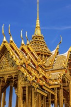 The Grand Royal Palace, the gilded Abhorn Bimok Pavilion with overlapping roofs and curved chofas,