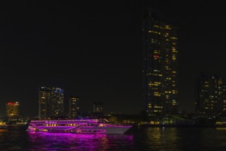 Illuminated tour boat on Chao Phraya River, night view, Bangkok, Thailand's metropolis, Thailand